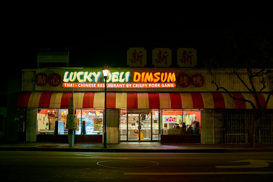 a restaurant called lucky melon dimsum at night